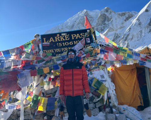 client at larke pass during manaslu circuit trek